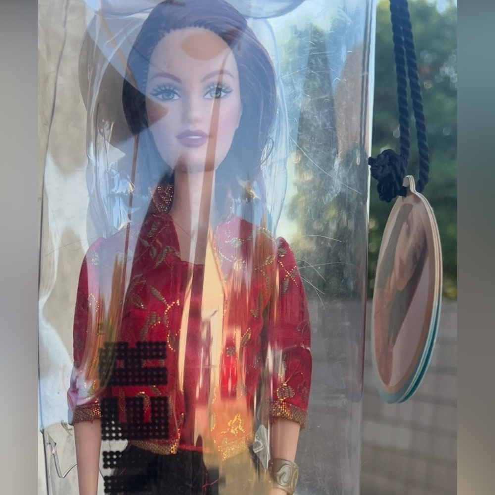 Barbie Doll in Elegant Red and Gold Ensemble